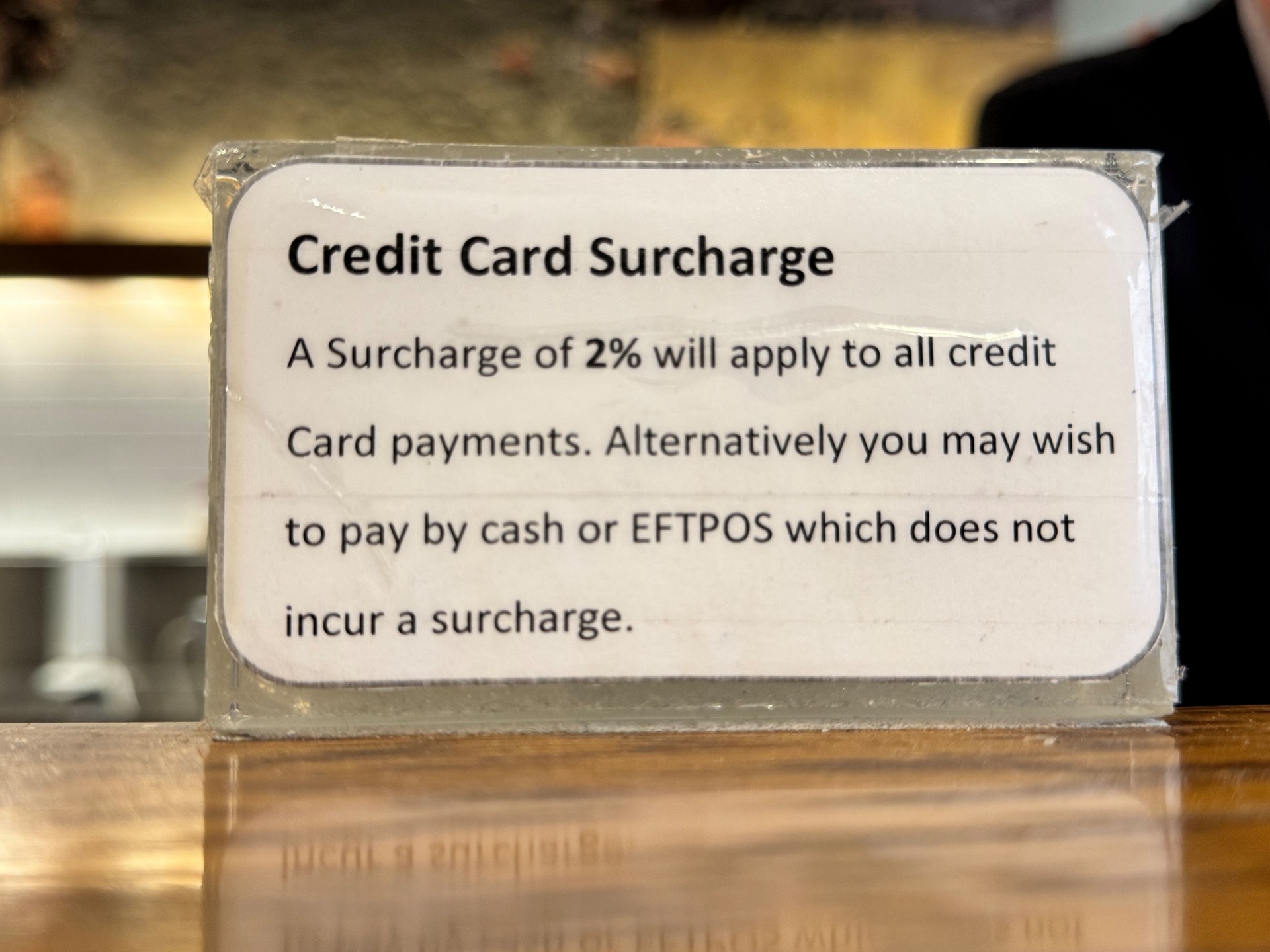 Credit Card Surcharge Notice on Counter